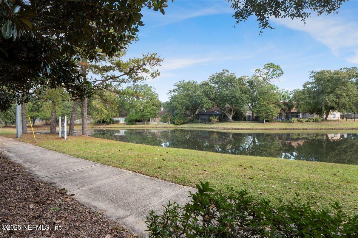 4032 Lonicera Loop St. Johns, FL 32259 - Photo 111 of 113 a view of lake with a yard
