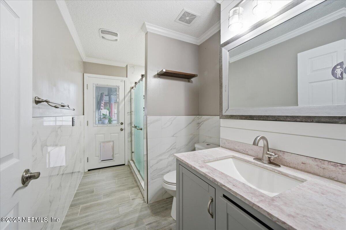 4032 Lonicera Loop St. Johns, FL 32259 - Photo 32 of 113 Guest Bathroom