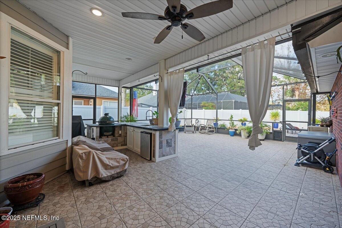 4032 Lonicera Loop St. Johns, FL 32259 - Photo 43 of 113 a room with gym equipment and large windows