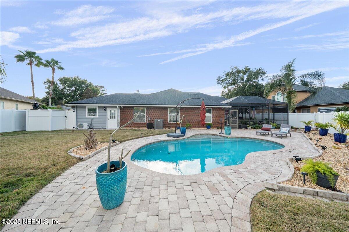 4032 Lonicera Loop St. Johns, FL 32259 - Photo 53 of 113 a front view of house with outdoor space and swimming pool