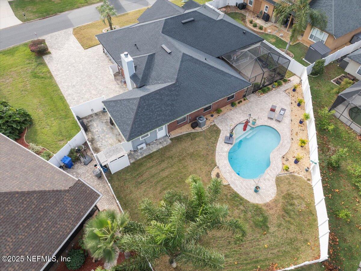 4032 Lonicera Loop St. Johns, FL 32259 - Photo 62 of 113 an aerial view of a house with swimming pool