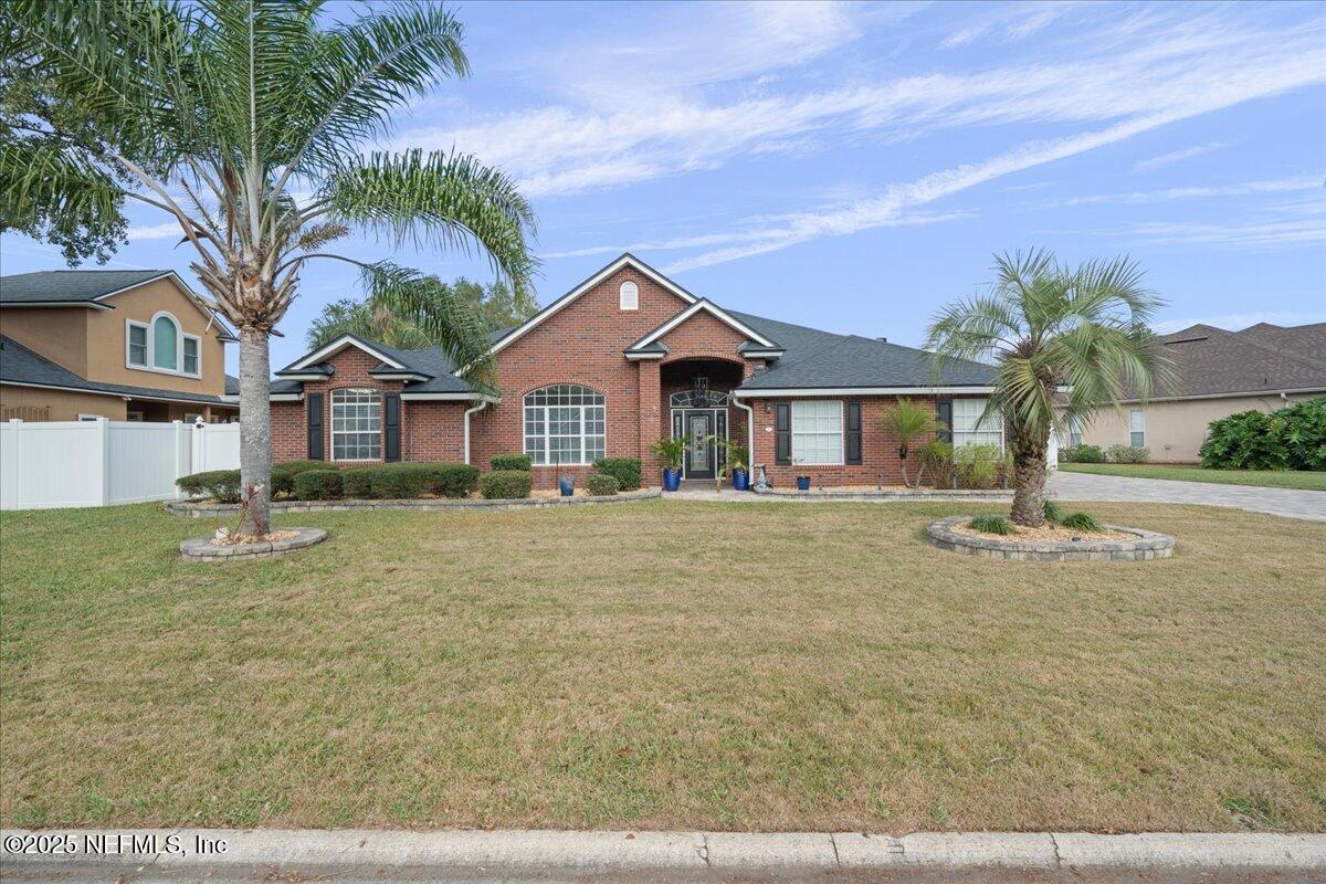 4032 Lonicera Loop St. Johns, FL 32259 - Photo 80 of 113 a front view of a house with a garden