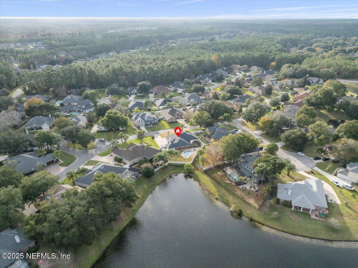 4032 Lonicera Loop St. Johns, FL 32259 - Photo 86 of 113 an aerial view of residential houses with outdoor space and trees
