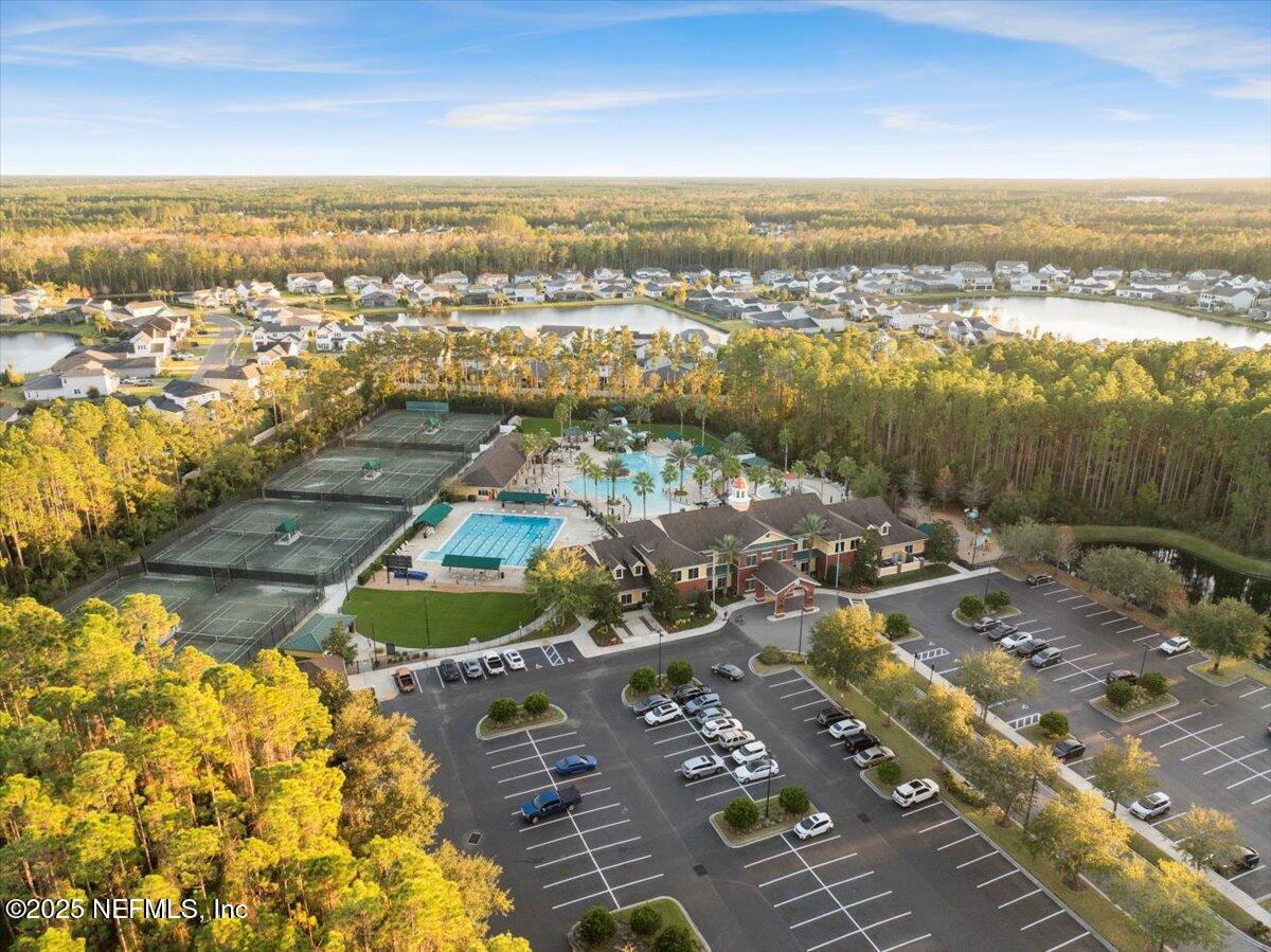 4032 Lonicera Loop St. Johns, FL 32259 - Photo 94 of 113 an aerial view of residential building and lake view