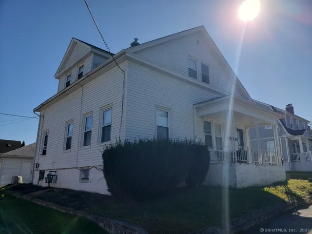 a view of house with garden