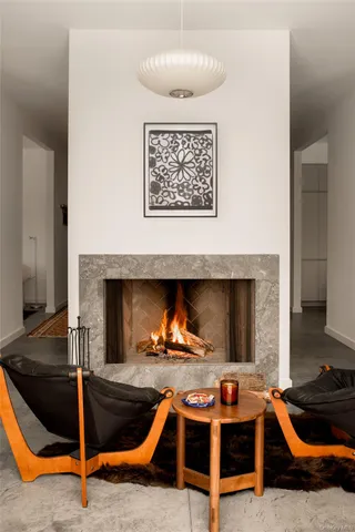 a living room with furniture and a window