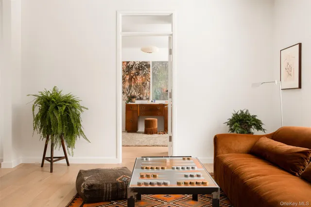 a bedroom with a bed and lamp