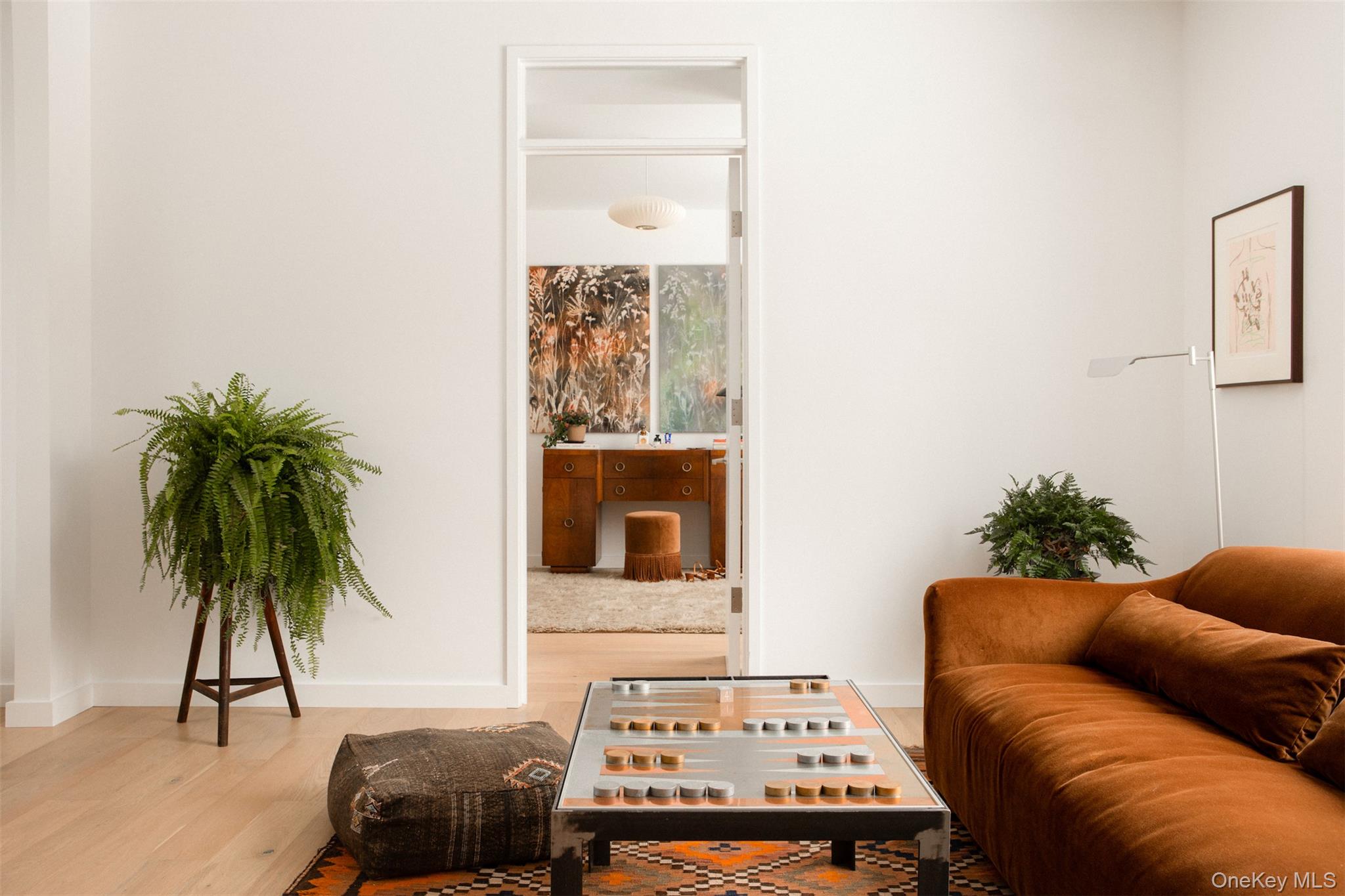 49 Sky Top Road Copake, NY 12516 - Photo 17 of 40 a living room with furniture and a potted plant