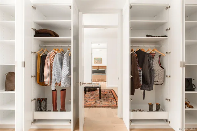 a bed room with a bed and a window