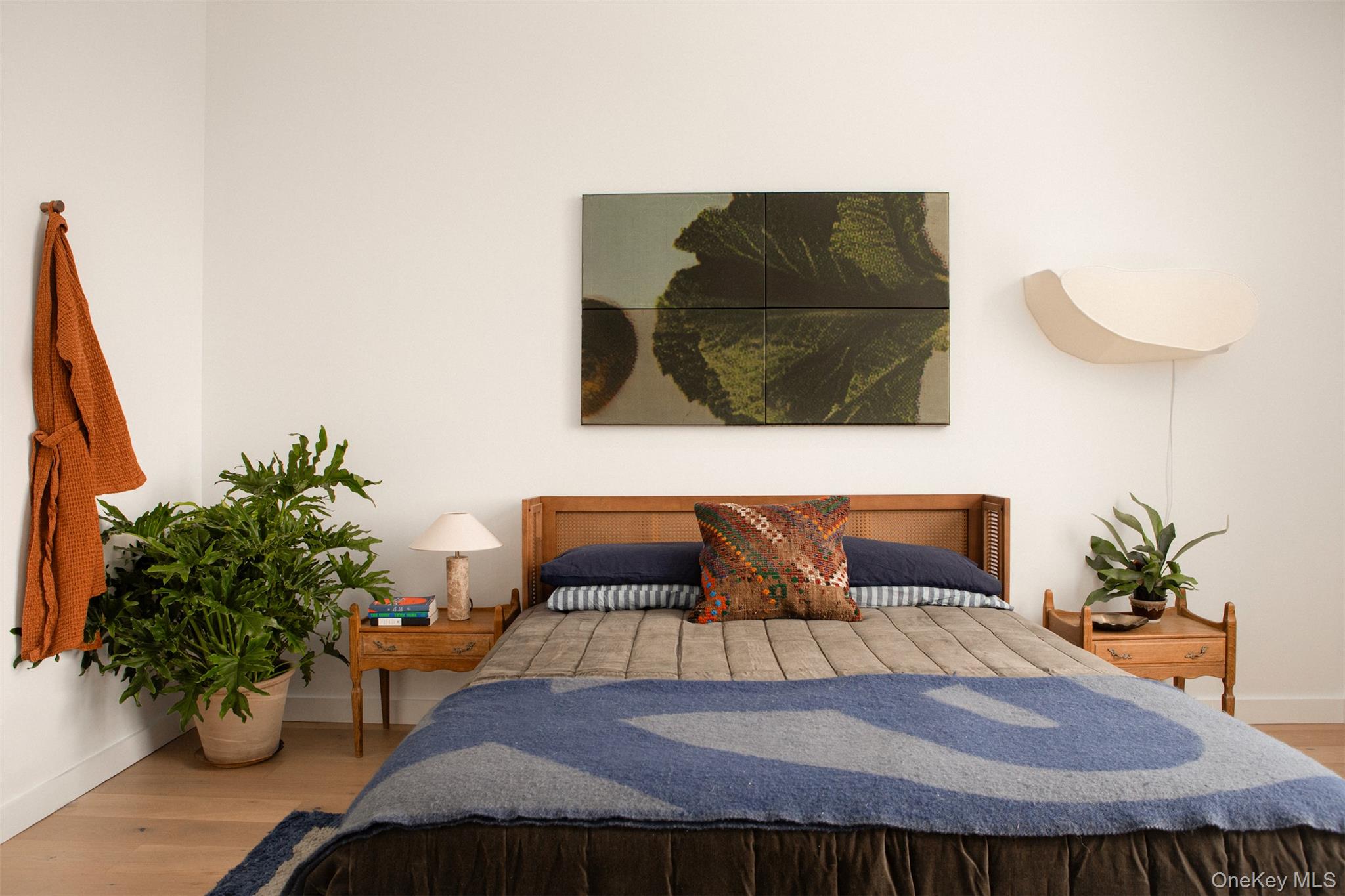 49 Sky Top Road Copake, NY 12516 - Photo 27 of 40 a bedroom with a bed and a potted plant