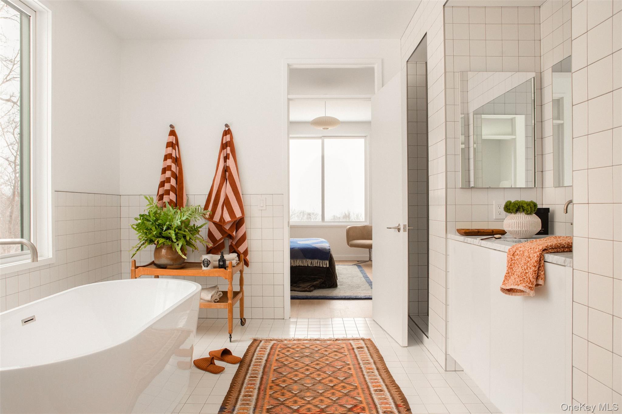 49 Sky Top Road Copake, NY 12516 - Photo 29 of 40 a bathroom with a bathtub and a shower