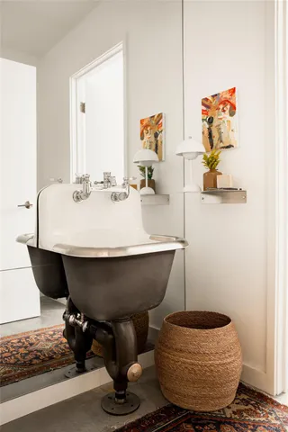 a room with a desk and a workspace