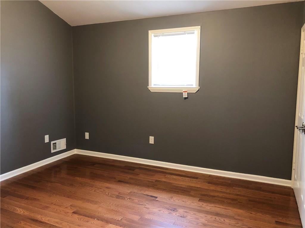 31 Dovercrest Road Eighty Four, PA 15330 - Photo 12 of 23 Bedroom #3 with large closet and hardwood floors.