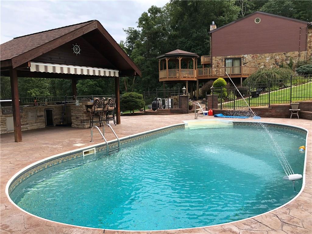 31 Dovercrest Road Eighty Four, PA 15330 - Photo 20 of 23 Heated unground pool that's perfect for entertaining.