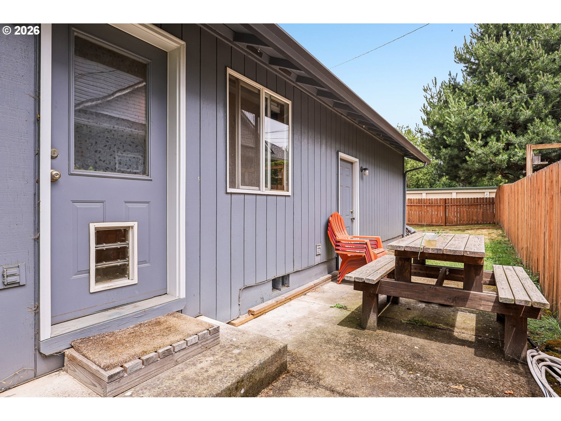 608 Southeast Sumner Street Camas, WA 98607 - Photo 22 of 39 a backyard of a house with seating space