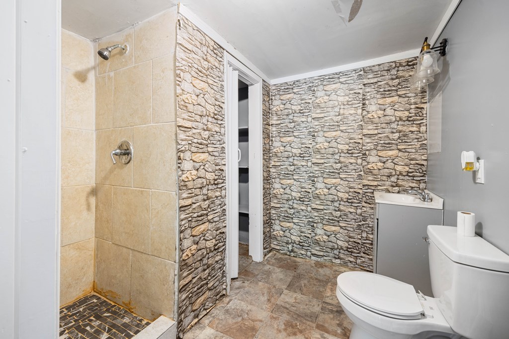 2113 Summerville Road Phenix City, AL 36867 - Photo 31 of 37 a bathroom with a toilet and shower