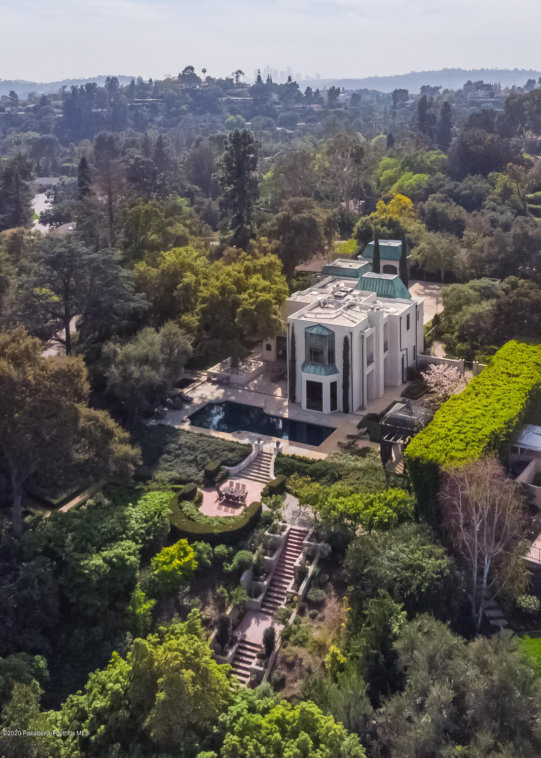 a view of a house with a garden