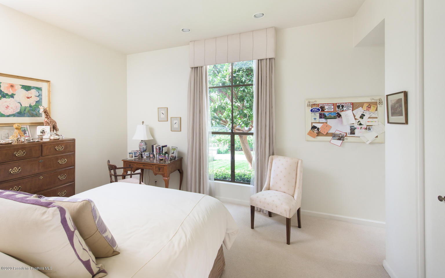 988 Buckingham Place Pasadena, CA 91105 - Photo 16 of 38 a bedroom with a bed and a chair