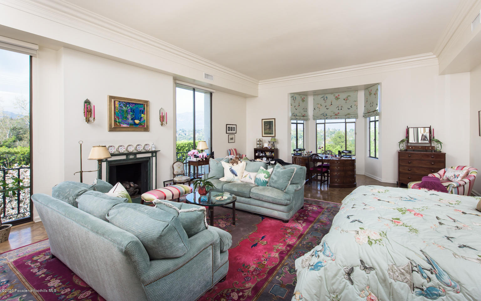 988 Buckingham Place Pasadena, CA 91105 - Photo 19 of 38 a living room with furniture a window and a fireplace
