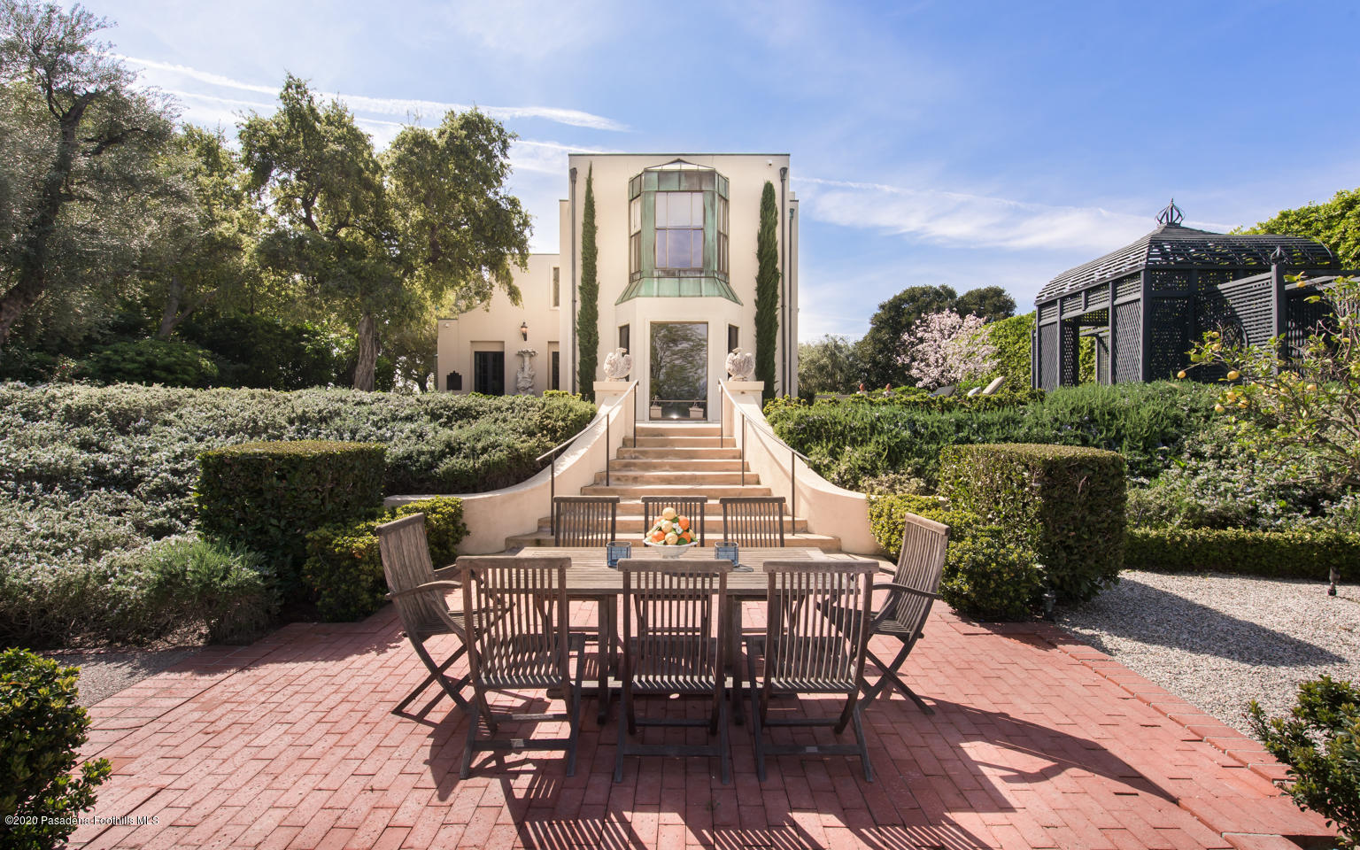 988 Buckingham Place Pasadena, CA 91105 - Photo 28 of 38 a front view of a house with a yard