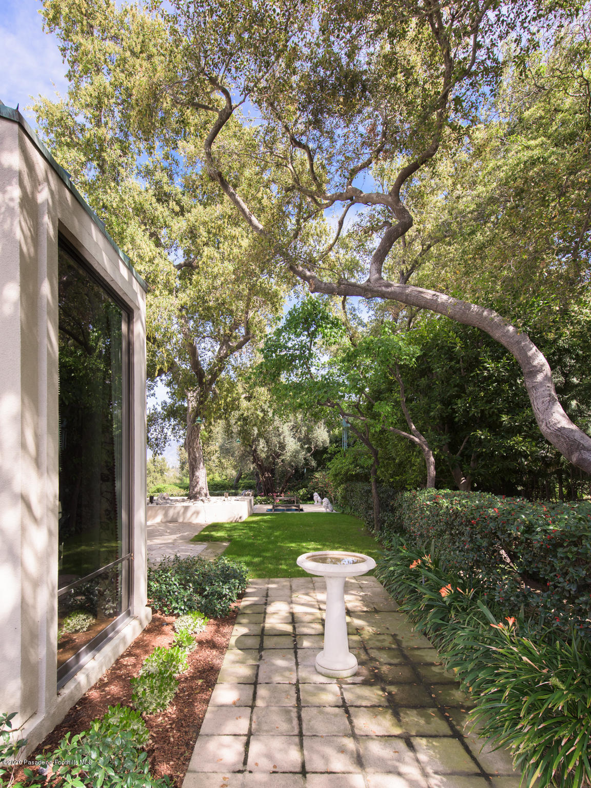 988 Buckingham Place Pasadena, CA 91105 - Photo 32 of 38 a view of a pathway with a tree