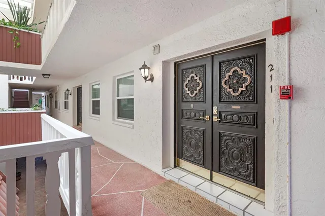 a picture of a bench in front of a building