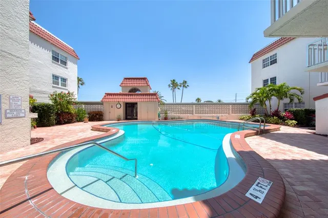 a front view of a house with swimming pool