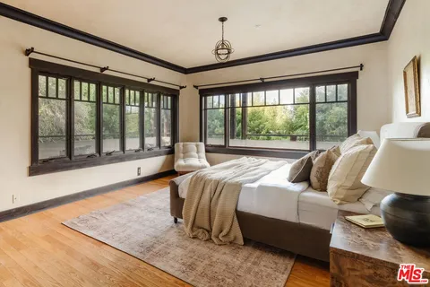 a bathroom with a shower a toilet and a sink
