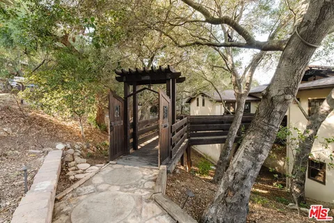 a view of entryway with wooden door