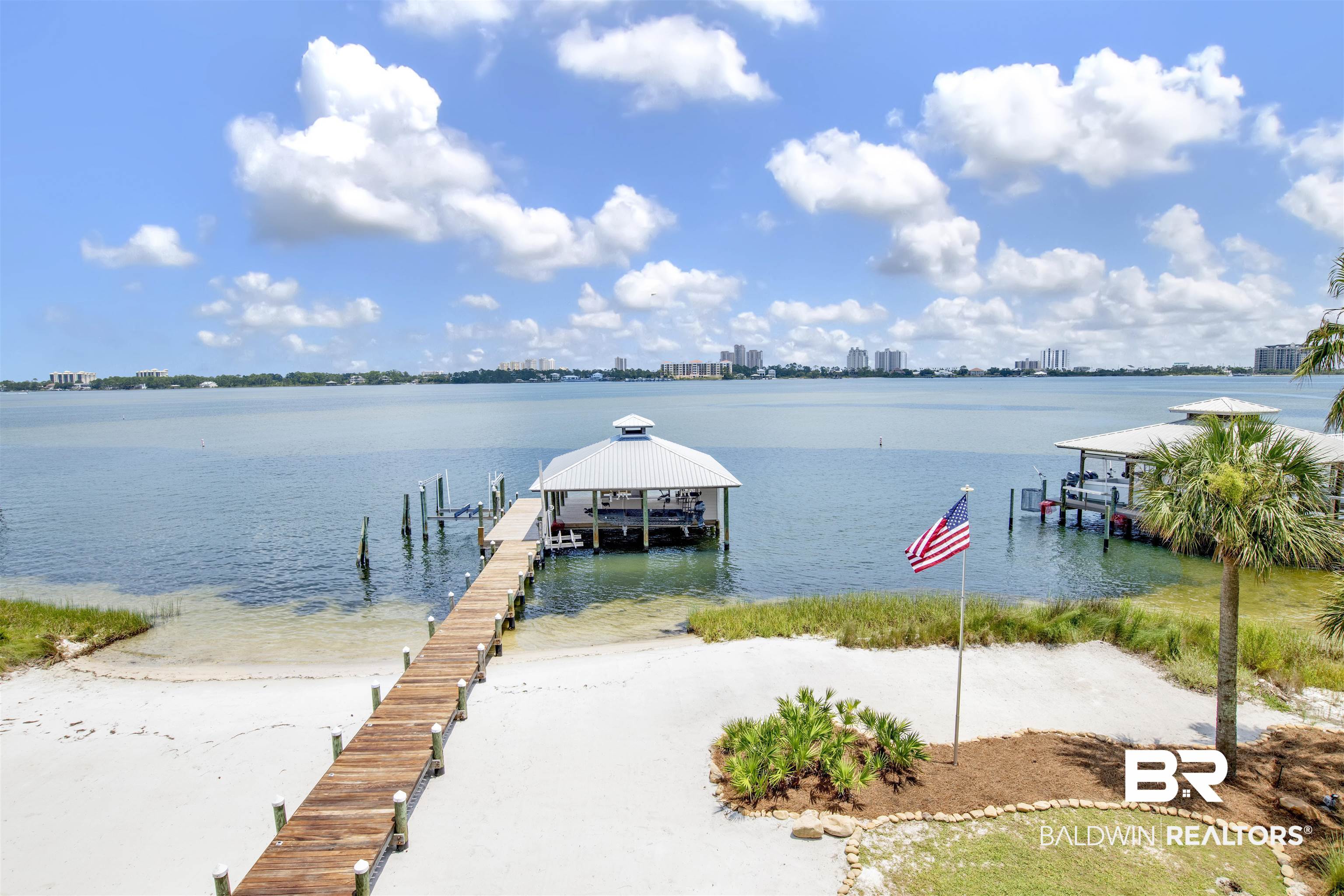 33400 River Road Orange Beach, AL 36561 - Photo 69 of 72 View of dock featuring a water view