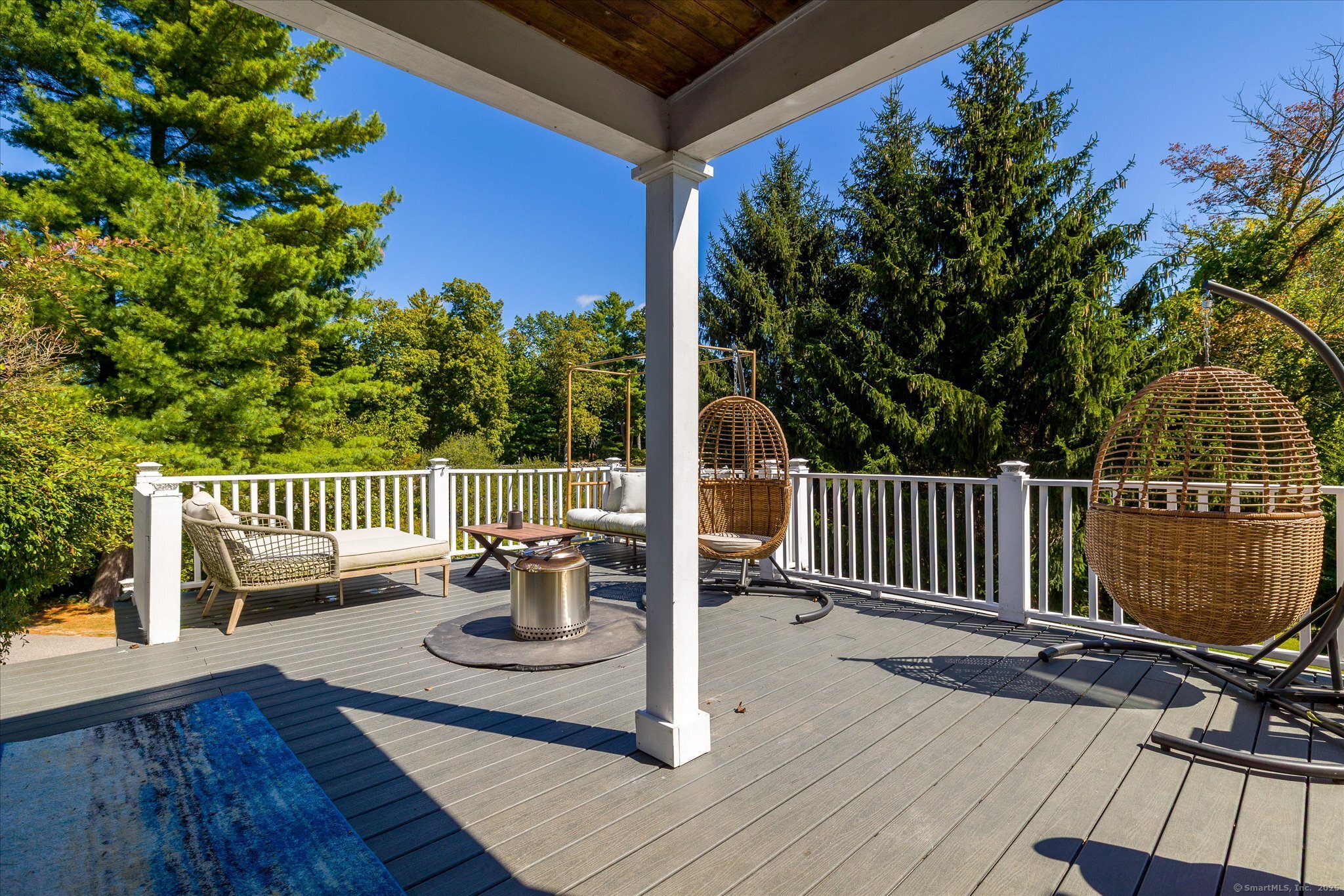 101 Child Hill Road Woodstock, CT 06281 - Photo 35 of 39 a view of a chairs and table on the wooden deck
