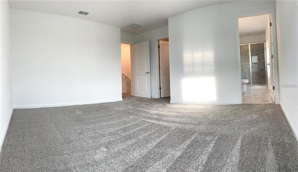 15609 Water Spring Boulevard Winter Garden, FL 34787 - Photo 13 of 36 a view of an empty room