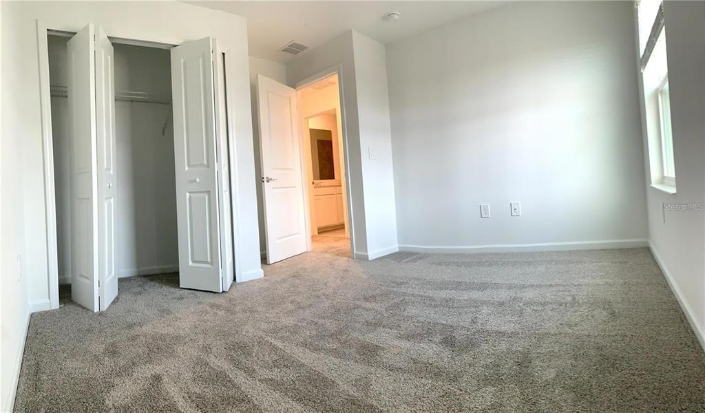 15609 Water Spring Boulevard Winter Garden, FL 34787 - Photo 17 of 36 a view of an empty room