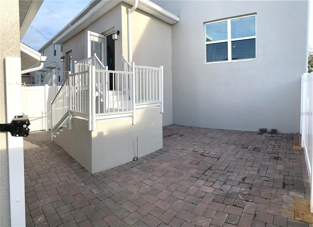 15609 Water Spring Boulevard Winter Garden, FL 34787 - Photo 20 of 36 a view of a livingroom with wooden floor and stairs