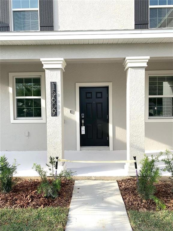 15609 Water Spring Boulevard Winter Garden, FL 34787 - Photo 7 of 36 a front view of a house