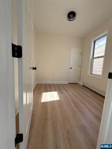 a bathroom with a sink toilet and mirror