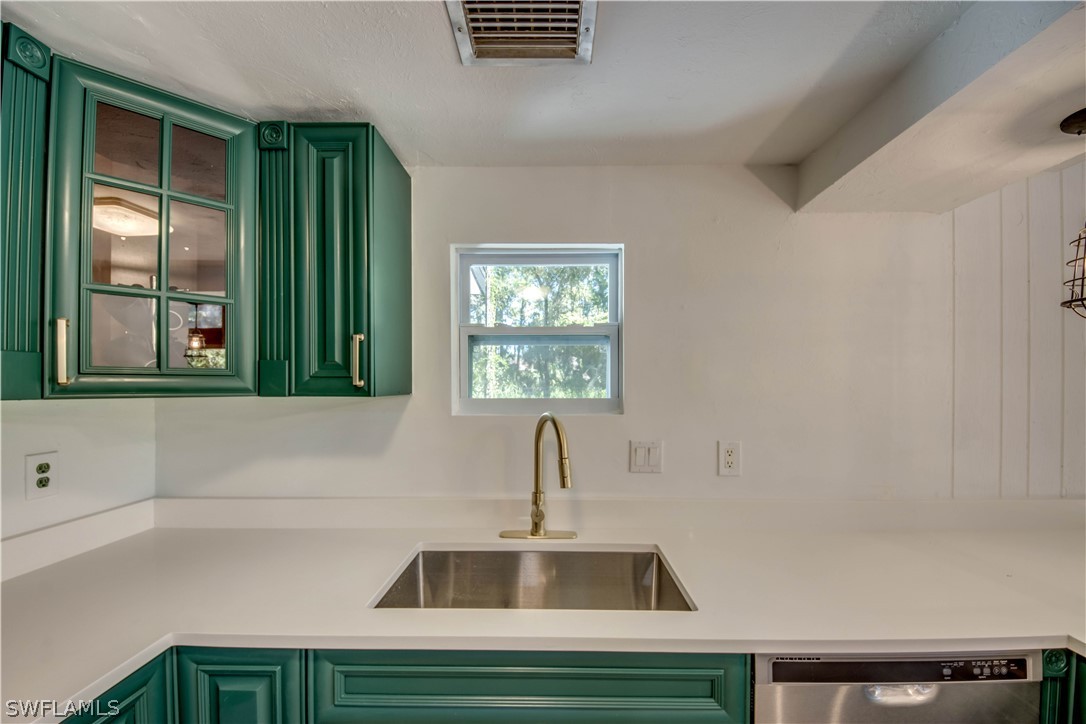 275 Trader Road Fort Denaud, FL 33935 - Photo 12 of 32 a bathroom with a sink and a window
