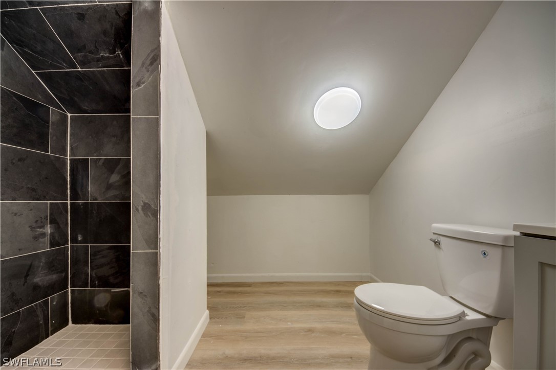 275 Trader Road Fort Denaud, FL 33935 - Photo 24 of 32 a bathroom with a toilet and a shower