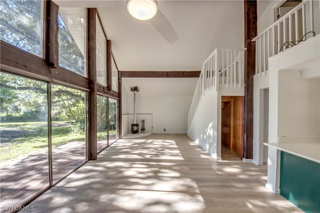 275 Trader Road Fort Denaud, FL 33935 - Photo 5 of 32 a view of an empty room with a balcony