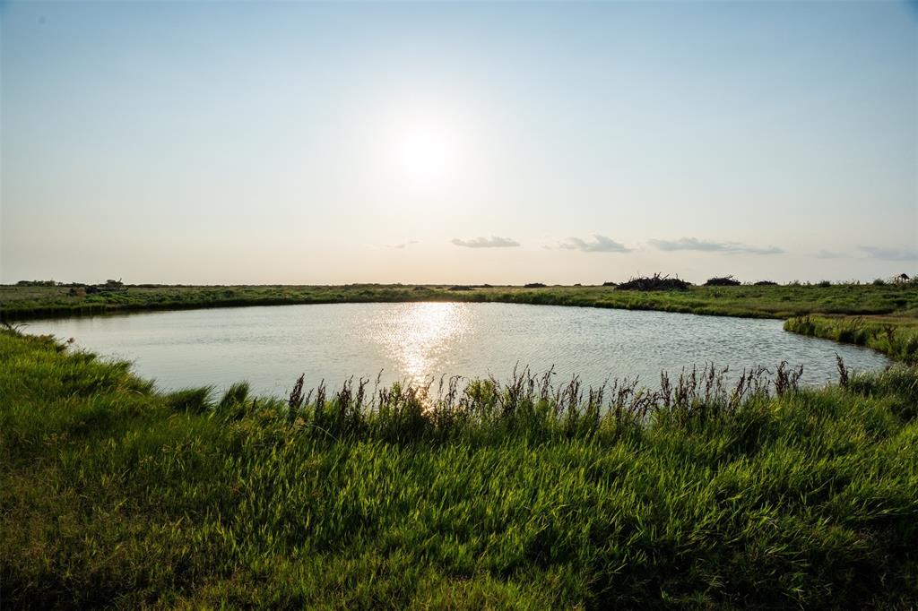 1543 Highway 258 Wichita Falls, TX 76310 - Photo 27 of 40 a view of a lake with houses in the back