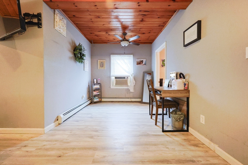 273 Tremont Street Fall River, MA 02720 - Photo 19 of 37 a view of a livingroom with furniture and window