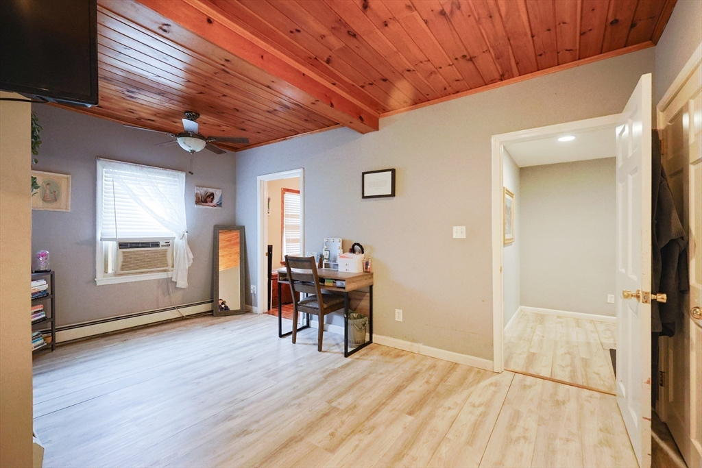 273 Tremont Street Fall River, MA 02720 - Photo 20 of 37 a view of a livingroom with furniture and windows