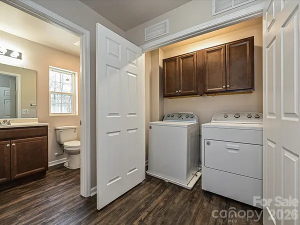 a view of a storage and utility room in a house