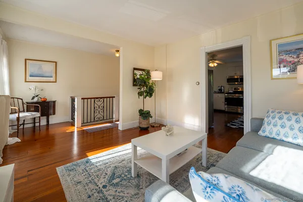 a kitchen with a sink appliances and cabinets