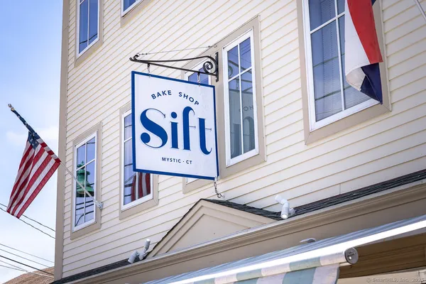 a view of a street sign on a building