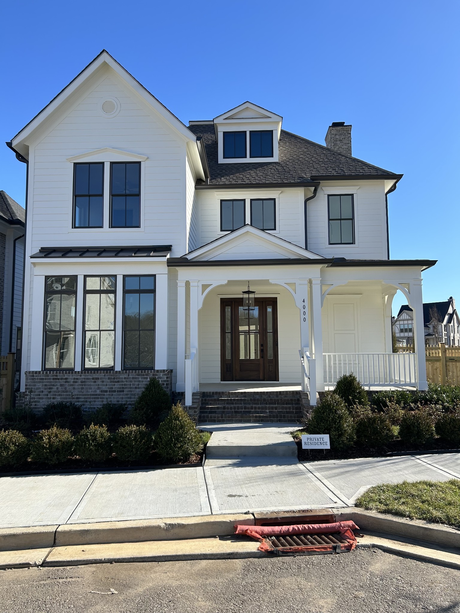 4000 Forestside Drive Franklin, TN 37064 - Photo 1 of 12 a front view of a house with a yard and garage