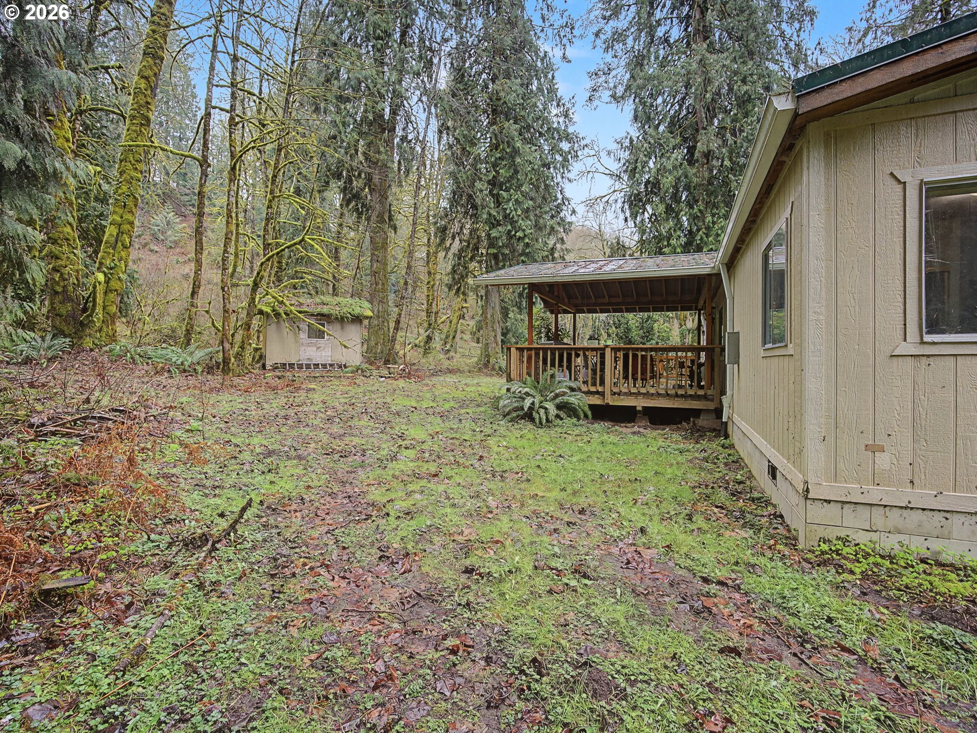 41180 Southeast Kubitz Road Sandy, OR 97055 - Photo 31 of 35 a backyard of a house with barbeque oven
