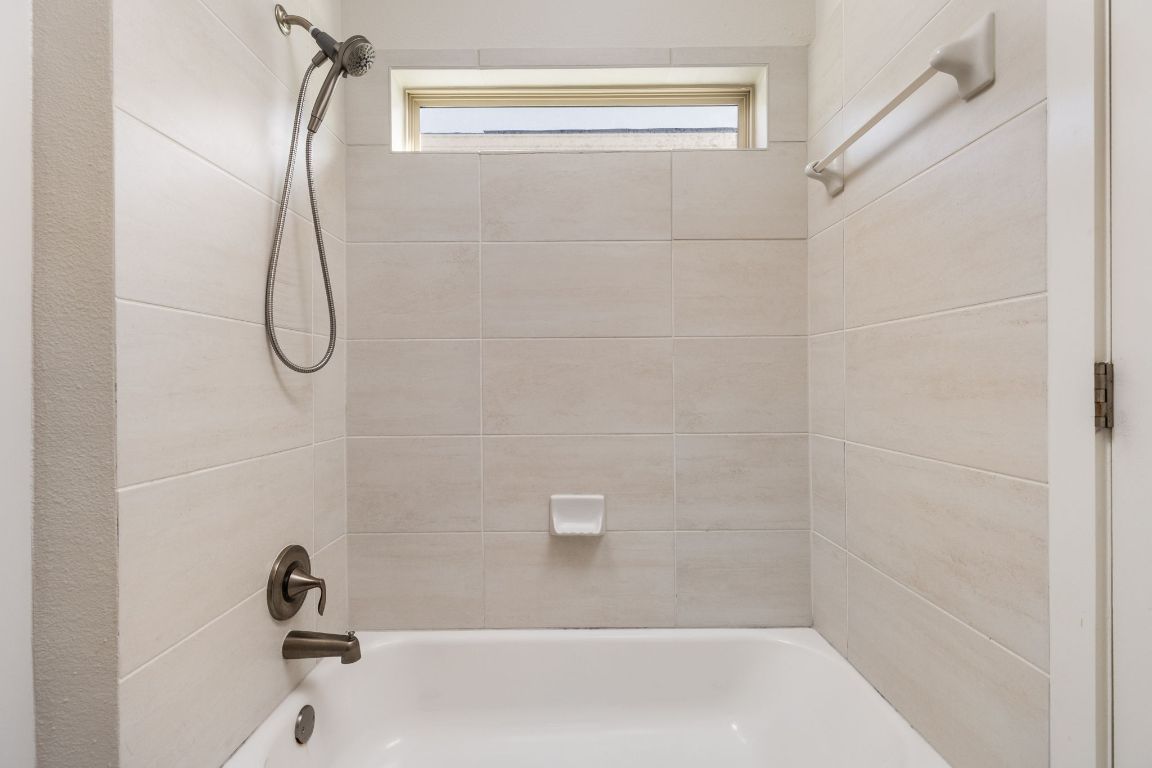 2401 McBee Street Austin, TX 78723 - Photo 29 of 36 Bathroom with tub / shower combination