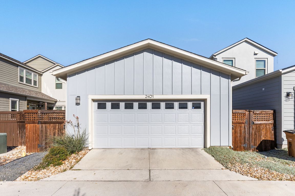 2401 McBee Street Austin, TX 78723 - Photo 36 of 36 Garage featuring concrete driveway