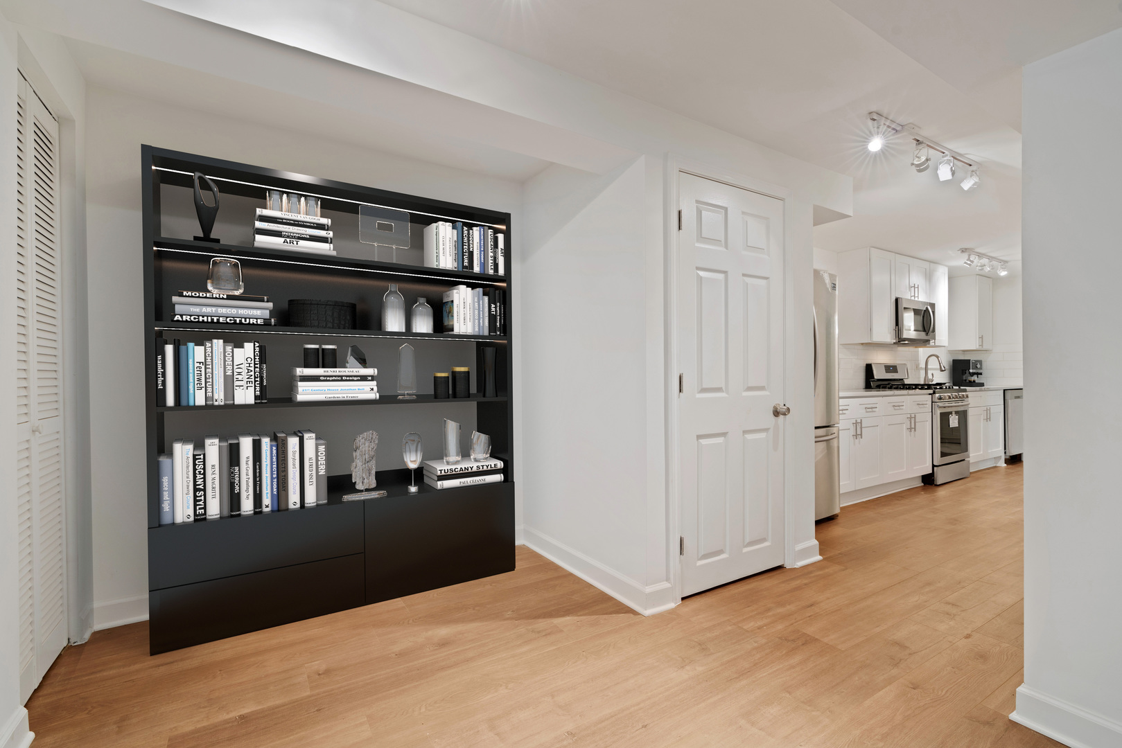 1734 West Erie Street, Unit G Chicago, IL 60622 - Photo 6 of 18 a view of kitchen with refrigerator and wooden floor